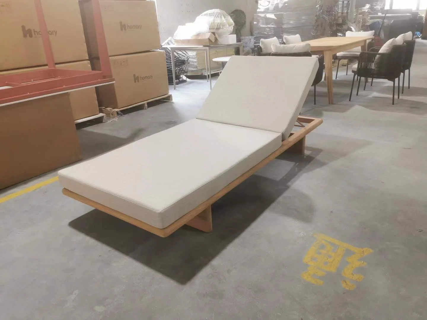 Angled view showing the design details of the Adjustable-Platform-Teak-Chaise-Lounge